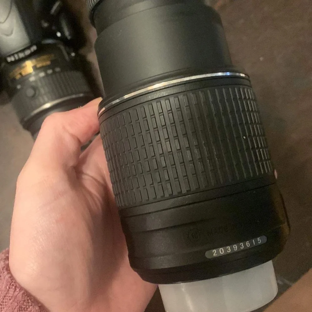Nikon D3200. 2 lenses. Charger. Camera bag. Pretty much brand new.